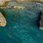 The most beautiful beaches in Procida seen from the sea