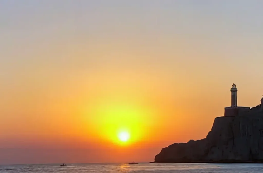 "Il Faro" Capri at sunset by the sea