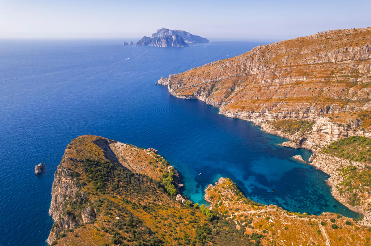 Baia di Ieranto: The Protected Bay Facing the Faraglioni - Lucatourboat